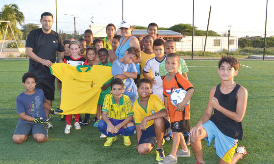 Talented Soccer athlete, Trinity Evanshen, brings joy and encouragement to the little soccer players of Aruba