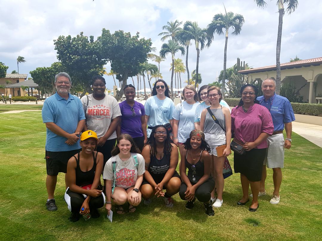 Group picture of professors and students from U.S.-based Mercer University gather with Ewald Biemans (far right), owner/CEO of Bucuti & Tara Beach Resort and noted environmentalist
